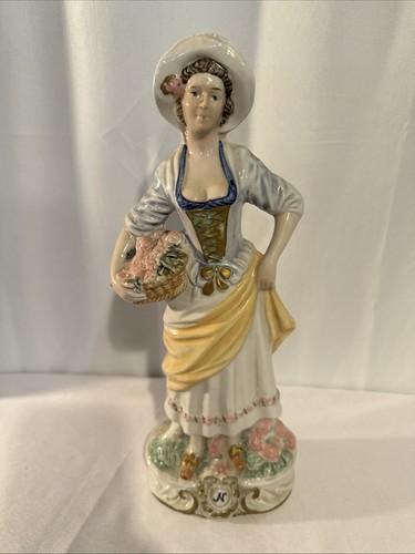 Capodimonte igurine holding - f,