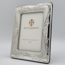 Cornice in argento massiccio
