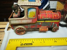 VECCHIO GIOCATTOLO LOCOMOTIVA Trenino  in LATTA - A MOLLA TETTO BIANCO