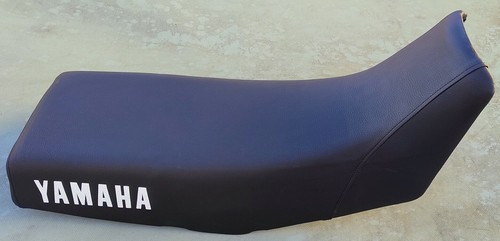 Housse selle noire neuve - de,