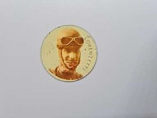 figurina dischetto metallico