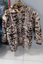 pelliccia lapin con inserti di pelle