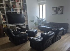 divani 3 posti e tre poltrone modello Coronado in pelle nera Cassina  anni 60 