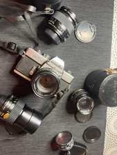 MINOLTA SRT 101 + 3 ottiche 28mm f2.8 MD  -50mm f1.7- 135mm F3.5