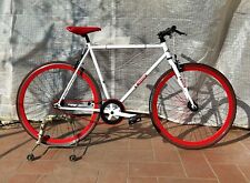 bicicletta bianca e rossa da uomo 