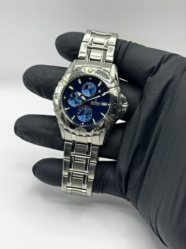 Festina blue dial date - w/,