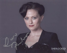 LARA PULVER as Irene Adler -