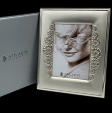 Cornice in argento firmata Italiana da arredamentoluxury salotto e Pacco Regalo.