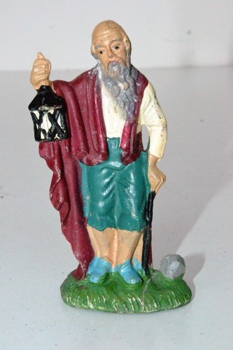 Vecchia statuina per - vecchia,