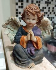 Statuina Angelo bambino in