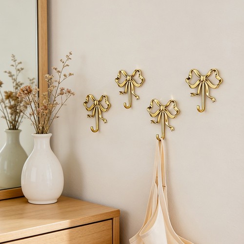 Ganci parete minimalisti - ganci,