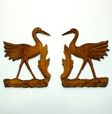 Coppia di fregi intagliati in