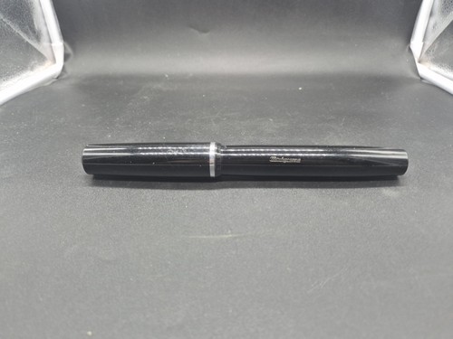 Vecchia penna stilografica - a),