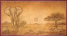 pirografia quadro  "TRAMONTO AFRICANO"  50 X 90 Opera dell' inserzionista.