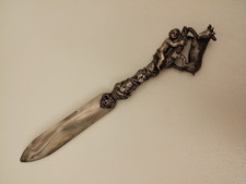 antico tagliacarte in argento massiccio dell'800. scultura bimbo e capra