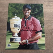 Capra Tiger Woods foto firmata