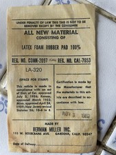 SEDIA LOUNGE EAMES ETICHETTA