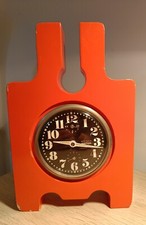 Particolare sveglia in legno arancione di KIENZLE boutique dim:21x14 funzionante