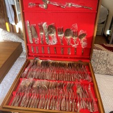 posate in ottone dorato