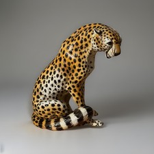 Grande scultura ghepardo metà