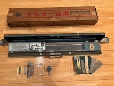 Macchina per maglieria Brother