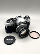 Olympus OM-10  + Olympus Zuiko 50mm f/1.8 [ serviced, new seals ]