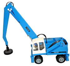 Caricatrice Conrad modello in metallo 2842 con magnete Fuchs 1:50 escavatore