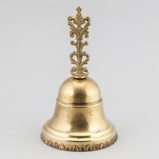 Campana a mano antica in ottone cesellata con decorazioni in rilievo merletto