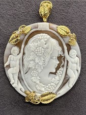 Ciondolo/Spilla in Oro 18Kt