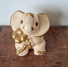 THUN ELEFANTE SEDUTO con quadrifoglio