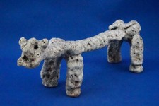 Stylized dog sculpture