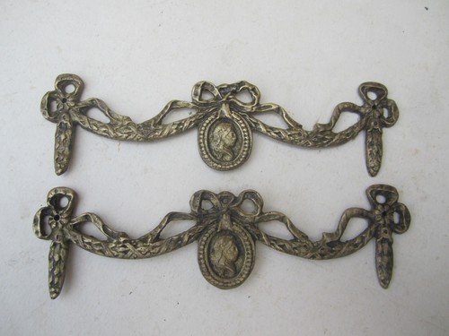Coppia fregi ottone x - fregi,