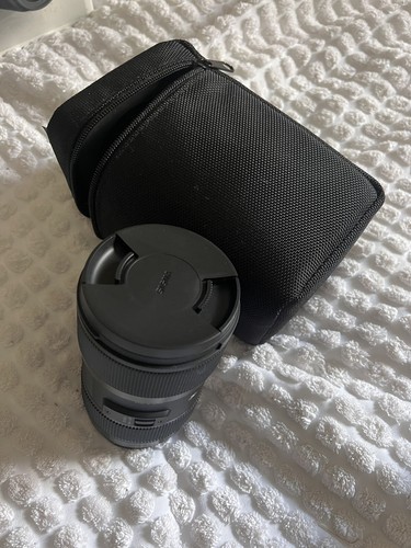 Sigma obiettivo f1 8 - sigma,