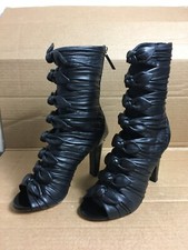 stivali chanel con decorazioni a fiocco - chanel boots with bow decorations