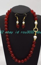 Orecchini collana gemme perle