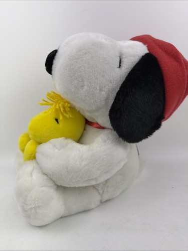 Hallmark snoopy hugging - ",