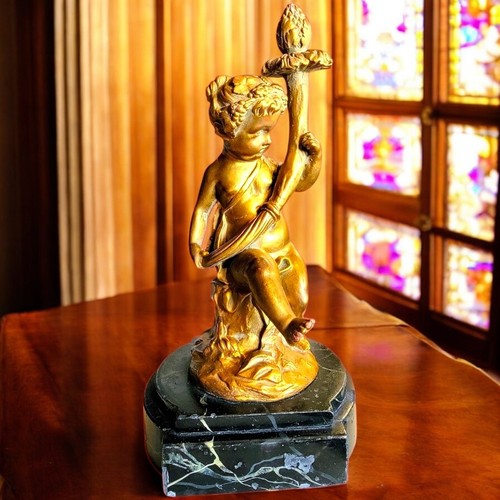 Antica statua cherubino putti