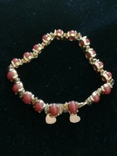 Antico bracciale da donna color oro con pietre colore rosso granato  anni 40
