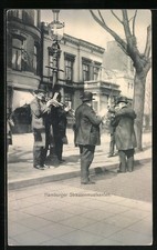 Cartolina Amburgo, musicisti di strada di Amburgo con strumenti a fiato 