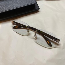 Occhiali da sole Cartier legno