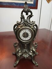 OROLOGIO BRONZO no sveglia FUSIONE, DA TAVOLO  MOVIMENTO A CORDA ALTEZZA 34 CM.