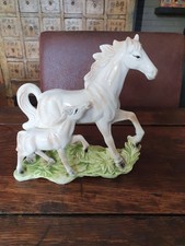 Statuetta in ceramica d'epoca