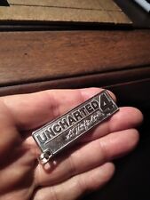 UNCHARTED logo piastrina Argento 925-produzione artigiana