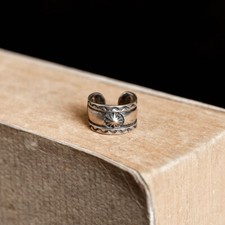 Orecchini bracciale simbolo