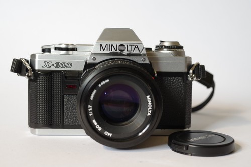 Minolta 300 md - +,