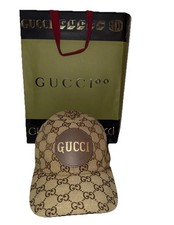 Berretto Gucci GG con busta e