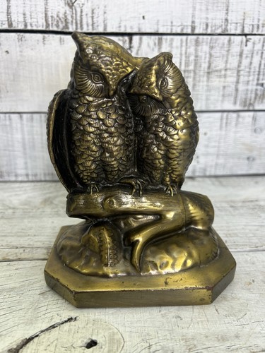 Statuina fermaporta metallo
