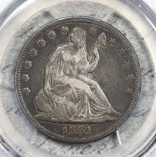 1861-O Seduto Liberty mezzo