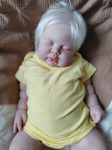 Bambola neonato sottaceto