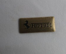 Ferrari emblem with sticker